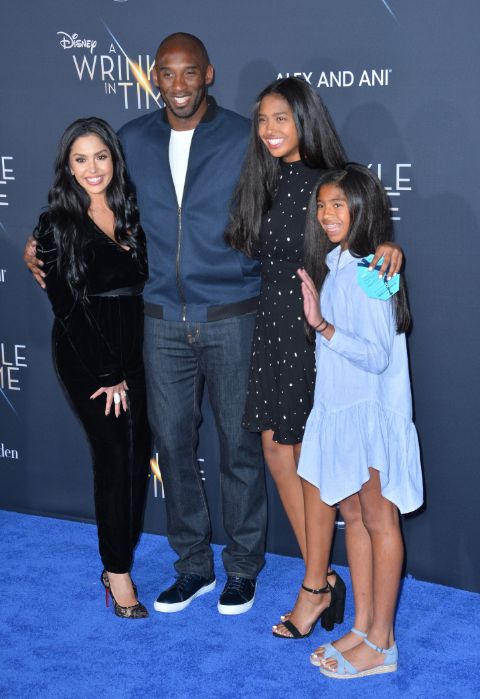 Vanessa Laine Bryant poses a picture with Kobe Bryant their children.